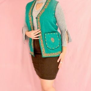 Vintage 1960s hand embroidered floral green vest. Size large. Bohemian